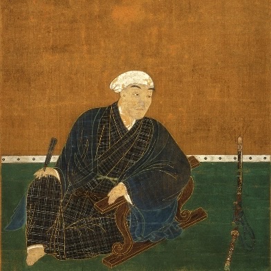白頭巾をかぶり寄几にもたれて座る、黒田如水の没後の肖像